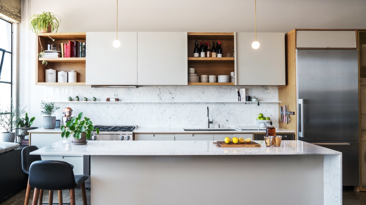 Even small  kitchens deserve a center counter—scale yours down to fit the space